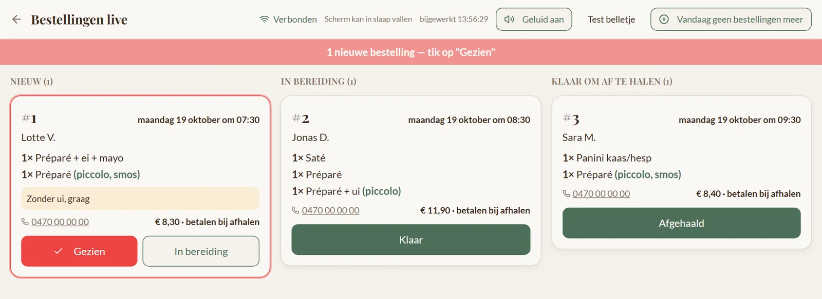 Live-scherm in de zaak met bestellingen in drie kolommen: nieuw, in bereiding en klaar om af te halen